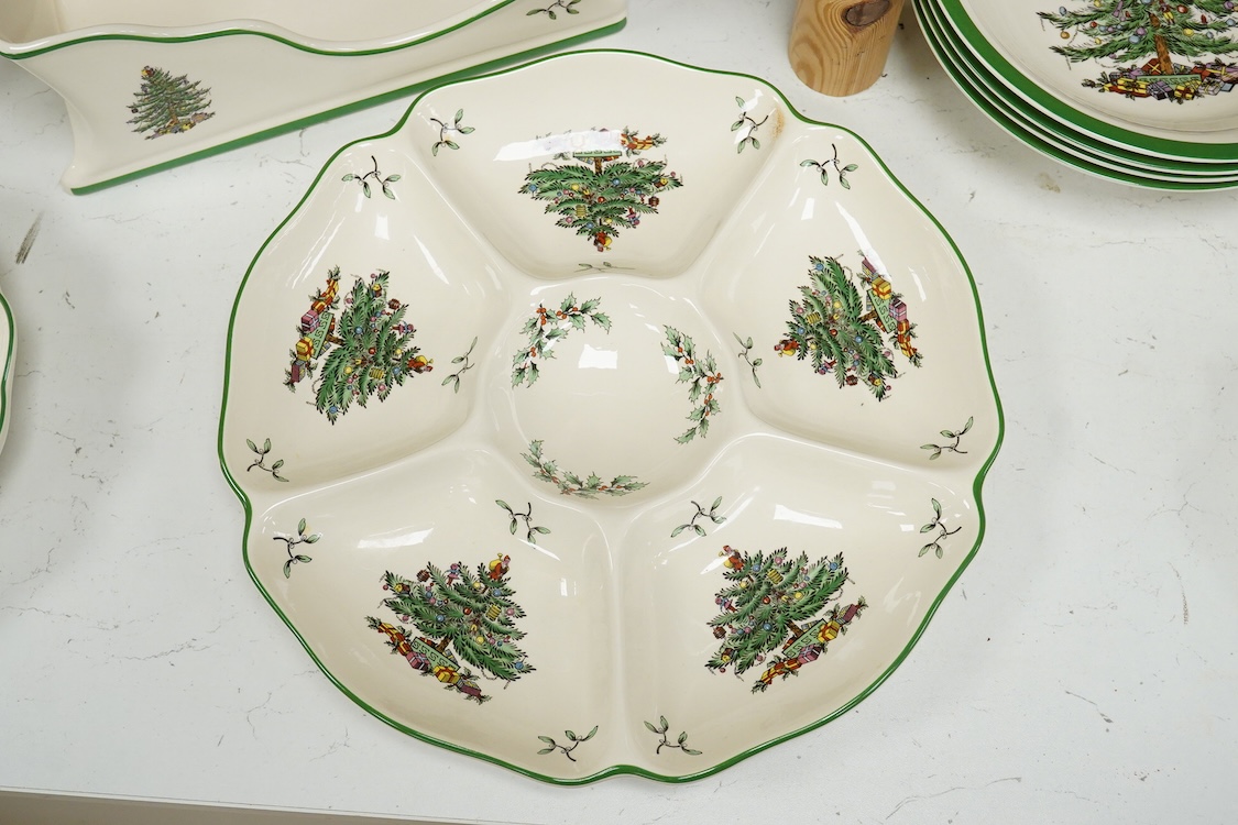 A Spode table service, Christmas Tree pattern. S 3324 to include a set of four bowls, platter and dishes, with some boxes, largest 36cm wide